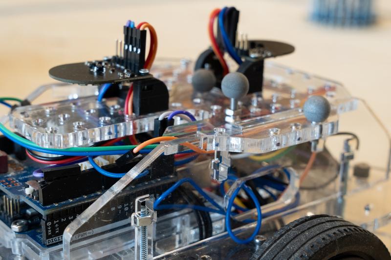 Exploring Centralization in Collective Robotic Construction